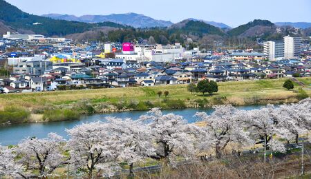 Miyagi, Japan - Apr 14, 2019. Aerial view of township with cherry blossom in Miyagi, Japan. Hanami (cherry blossom) is a cultural symbol of Japan, one of the events to attract tourists.のeditorial素材