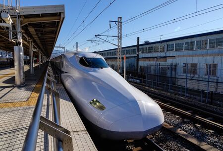 Osaka, Japan - Jan 1, 2016.  train stopping at railway station in Osaka, Japan. The trains are the fastest way to discover all of Japan, reaching a speed of 320 kmh.のeditorial素材