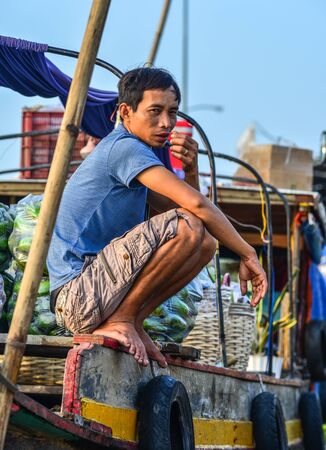 Soc Trang, Vietnam - Jan 19, 2020. Portrait of vendor at Nga Nam Floating Market in Mekong Delta. Floating market is one of the most attractive experiences when coming to Vietnam.のeditorial素材
