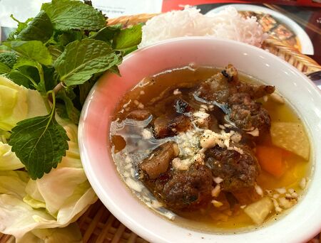Noodle with pork (Bun Cha), Vietnamese cuisine at local restaurant in Saigon, Vietnam.