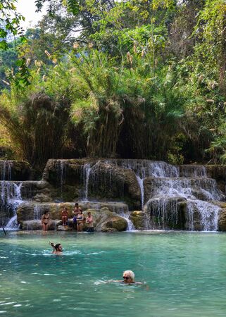 Luang Prabang, Laos - Feb 8, 2020. Kuang Si Falls in Luang Prabang, Laos. It is a three-tiered waterfall about 29 kilometers south of Luang Prabang.のeditorial素材