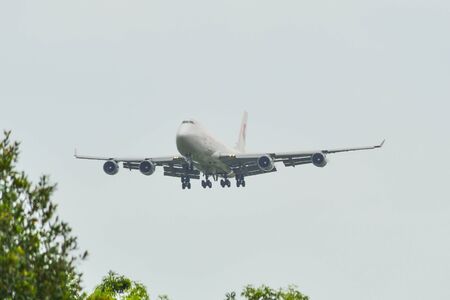 Singapore - Feb 11, 2020. B-2426 China Cargo Airlines Boeing 747-400F landing at Changi Airport (SIN). In 2019, Changi served 68.3 million passengers.のeditorial素材
