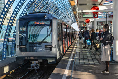 Amsterdam, Holland - Oct 7, 2018. Metro train at downtown in Amsterdam, Holland. Amsterdam known for...