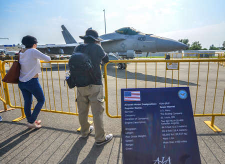 Singapore - Feb 10, 2018. People take pictures of fighter jet in Changi, Singapore. Defense costs...