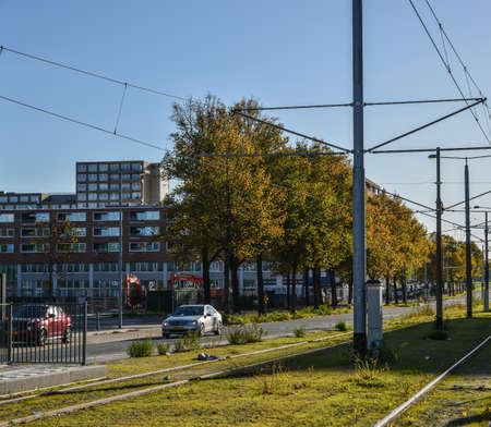Amsterdam, Holland - Oct 7, 2018. Cityscape of Amsterdam with famous architectural landmarks and busy traffic on roads.のeditorial素材