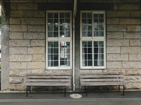 Wooden bench at the old train station in Hokkaido, Japan.の写真素材