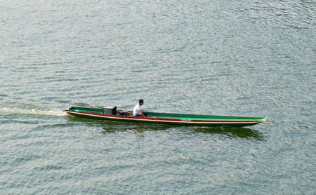 Luang Phrabang, Laos - Feb 4, 2020. Tourist boat on Mekong River in Luang Phrabang, Laos. The city was the capital of the kingdom of Laos for thousands of years until 1975.のeditorial素材