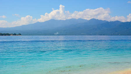 Beautiful seascape at summer on Gili Islands, Indonesia. Gili is known for its beautiful white sand beaches, and colorful coral reefs.の写真素材