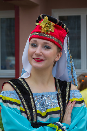 Polotsk Belarus, September 2. 2017: the day of Slavic writing. Beautiful girl in stage costume before a performance for the holiday concert.のeditorial素材