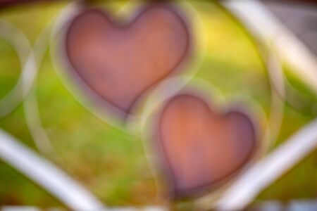 there are two blurred hearts in the sun. Hearts - as a concept of love, mutual understanding,...