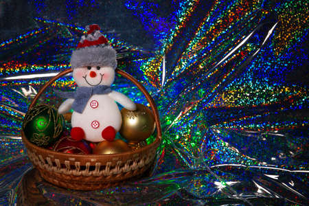 Colorful Christmas background with balloons and a fun snowman. Copy space.の写真素材