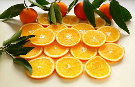 Fruit background with oranges and tangerines