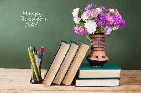 World Teacher's day concept. Flowers bunch, map, globe and books pileの写真素材