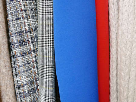 Modern woman clothing, large wardrobe with different clothes, home stuff, choice of clothes