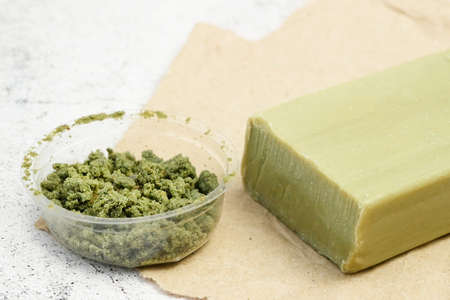 Green Herbal soap, Cannabis and natural cosmetic with marijuana plant concept.の写真素材