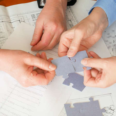 engineer holding pen pointing equipment architects On desk with a blueprints in the office,...
