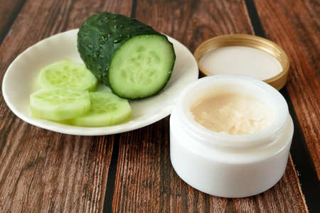 Cucumber cosmetic cream face and hand on silver background, skin and body care hygiene moisture lotionの写真素材