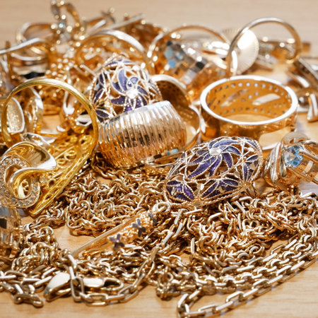 many golden and silver jewerly with copy space, pawnshop concept, jewerly shop