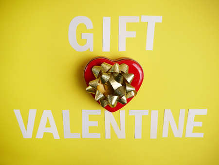 valentine gift box on green background
