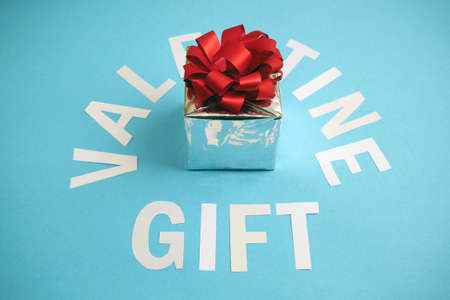 valentine gift box on green background