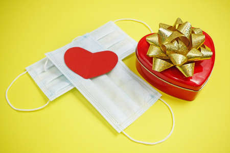 health in valentine's day composition with two medical mask and red hearts symbols