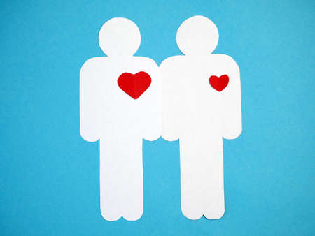 heart symbol between two people. love and relationship concept, valentine's day, closeupの写真素材