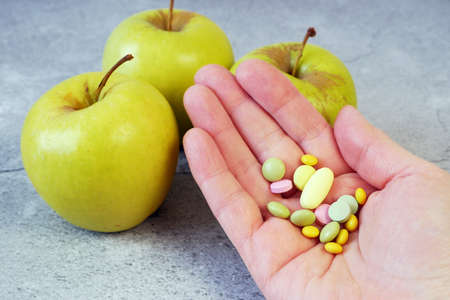 green apples vs pills concept