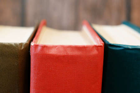 stack of books on the shelf, pile Of old books, closeupの写真素材