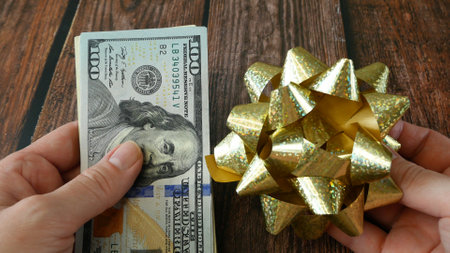 Money Gift, Money and bow on wooden background, closeup