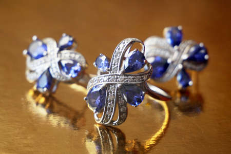 earring and ring set with big blue tanzanite and white diamonds around, jewerly shop, pawnshop...