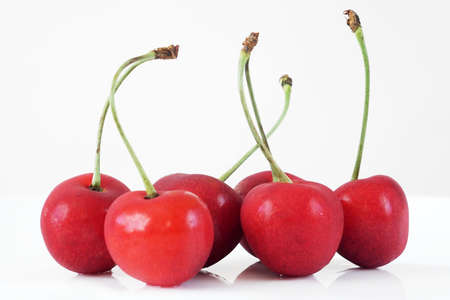 Sweet cherries. Fresh sweet isolated on white cherries. Delicious cherries. Closeup