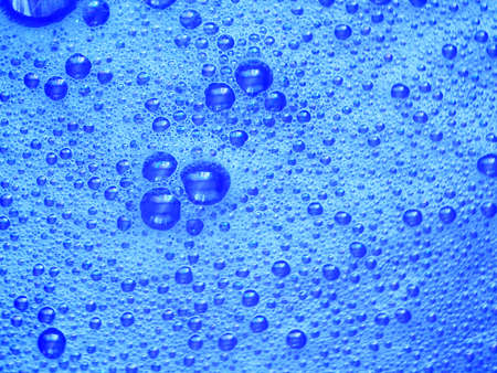 blue water with foam bubbles background, foam bubble dishwashing liquid, closeup