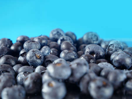 many tasty fresh blue berries backgroundの写真素材