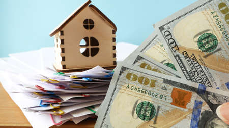 House model with real estate contract to buy house, insurance or loan and credit bank card real estate background, closeupの写真素材