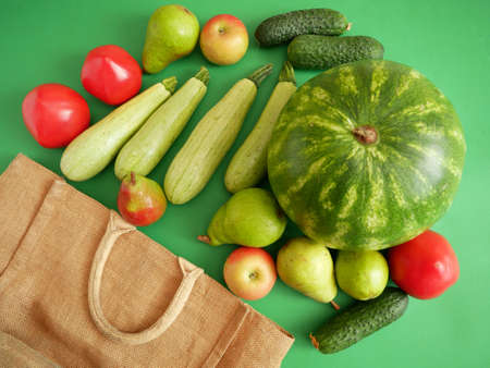 Organic Vegetables and fruits in cotton bag with copy space, green grocery delivery at home, zero...
