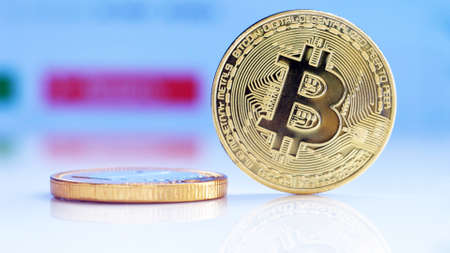Bitcoin and one euro gold coin. Cryptocurrency bitcoin the future coin. Virtual cryptocurrency...