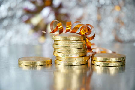 Cristmas greeting card with new year balls and coins, merry christmas and happy new year, closeupの写真素材