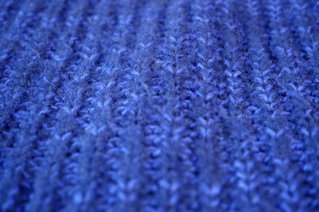 Details of knitted woolen fabric. textile background. Woolen Texture Background, Knitted Wool Fabric, Hairy Fluffy Textile. Closeupの写真素材