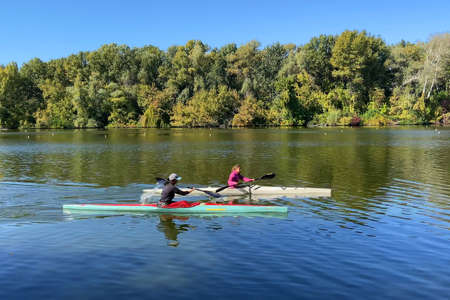 kayaking in the city river with canoe, kayak boat paddling, process of canoeingのeditorial素材