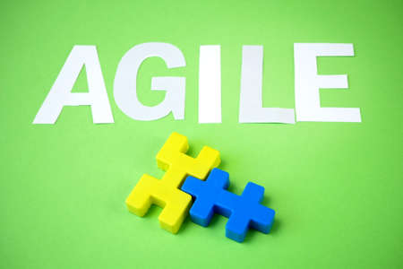 software agile word and puzzles, agile software development methodologies concept, closeup