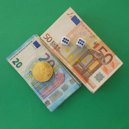Golden bitcoin on Euro money background. Bitcoin cryptocurrency. Crypto currency. Bitcoins on euro...