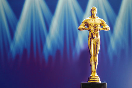 Hollywood Golden Oscar Academy award statue. Success and victory concept.のeditorial素材