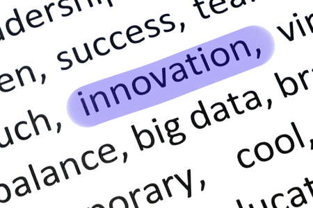 Word innovation undelnines among other words printed on white paper. Innovation is the practical implementation of ideas that result, closeupの写真素材