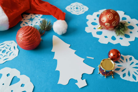 Making paper snowflakes and new year tree with your own hands. Merry Christmas and New Year concept. close-upの写真素材