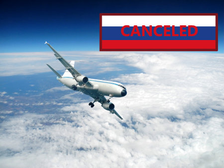 airplane is flying in the sky and ban sign, the top view, stop tourism from Russia, russian tourist ban conceptの写真素材