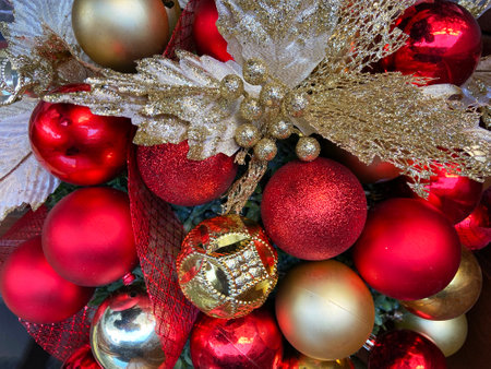 Many Red Christmas balls and golden new year decoration as Christmas and new year background, top view of pile of glass balls, closeupの写真素材