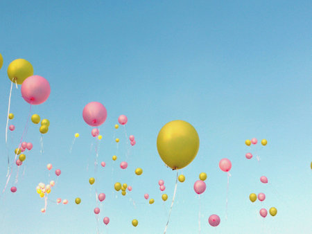 Colorful balloon floating in the air.の素材