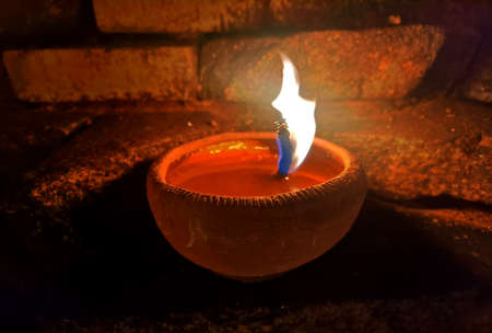 Festival of candles paraded on banana leavesの写真素材