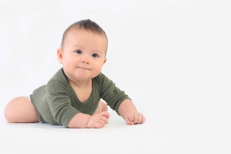 Baby on layin on stomachの写真素材