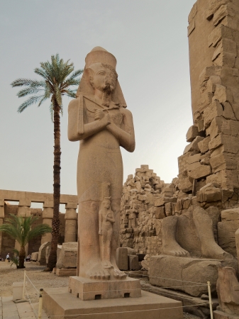 Statue of Pinedyem I in the first courtyard of the Temple of Amun at Karnak, Egypt, Africaのeditorial素材